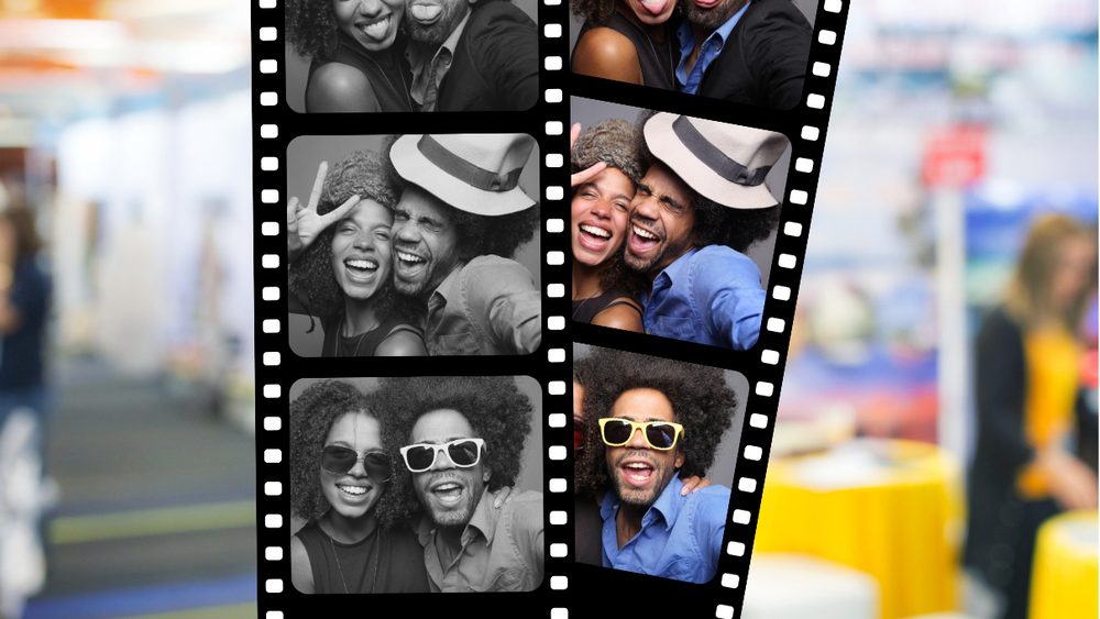 Two branded photo booth strips printed with a venue logo