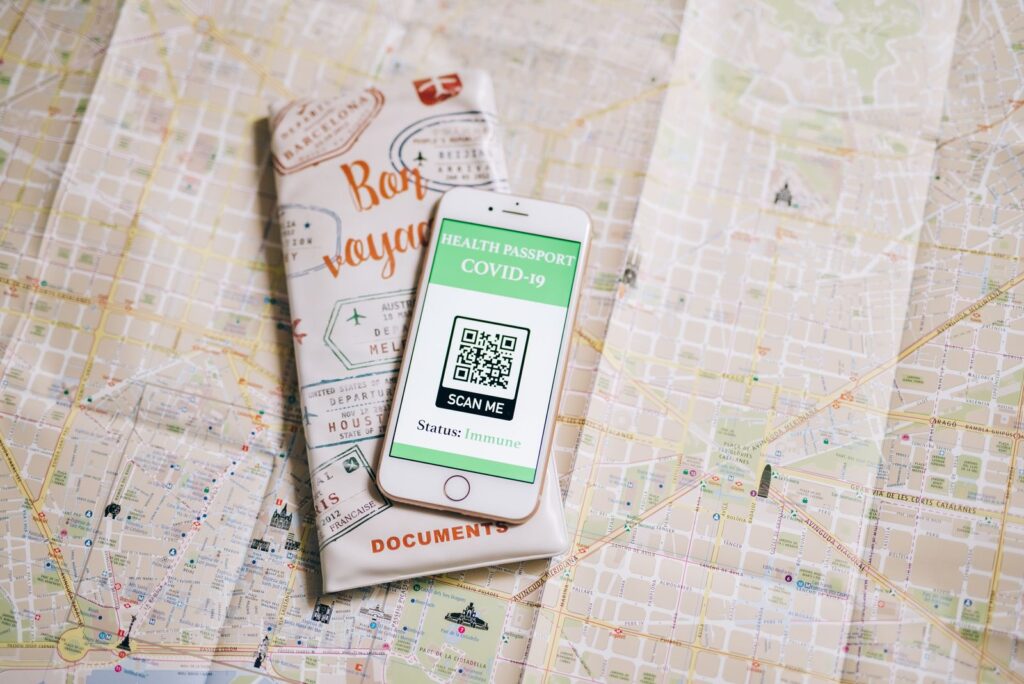 Guest scanning a code with a phone, the way photobooth software with QR code sharing delivers photos