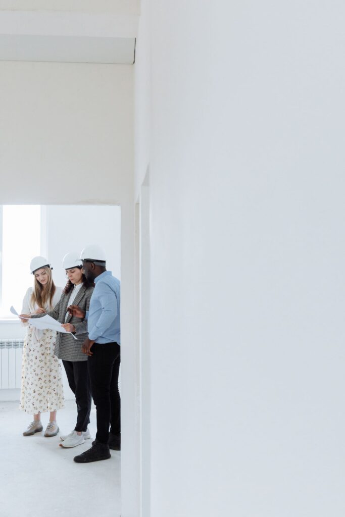 Reviewing plans on site before a photo booth installation